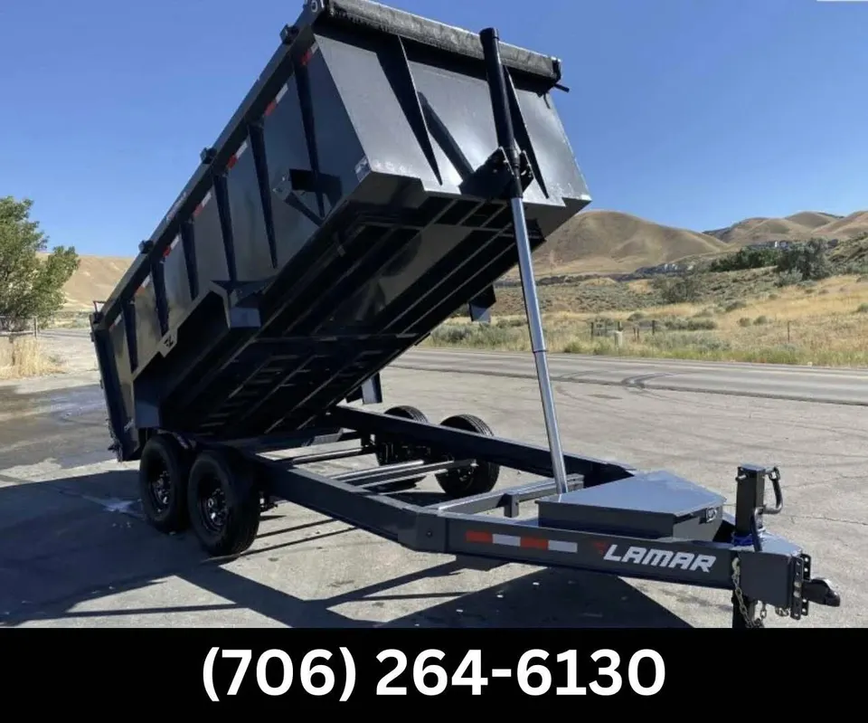 Hauling trailer loaded with cleared timber from development site